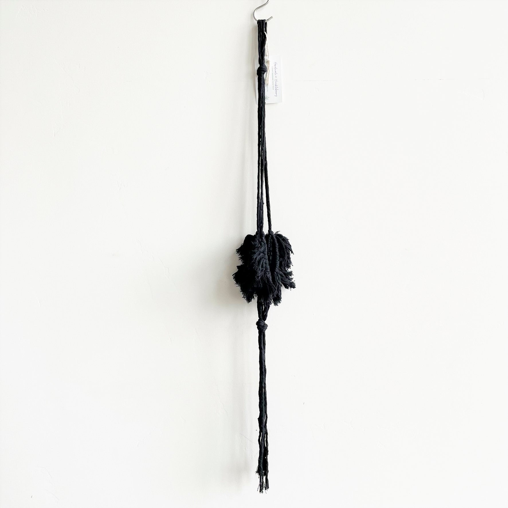 black macrame hanging planter Black Macramé Plant Hanger with Tufting